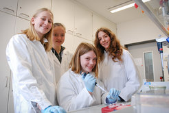 The girls are pipetting for the DNA processing